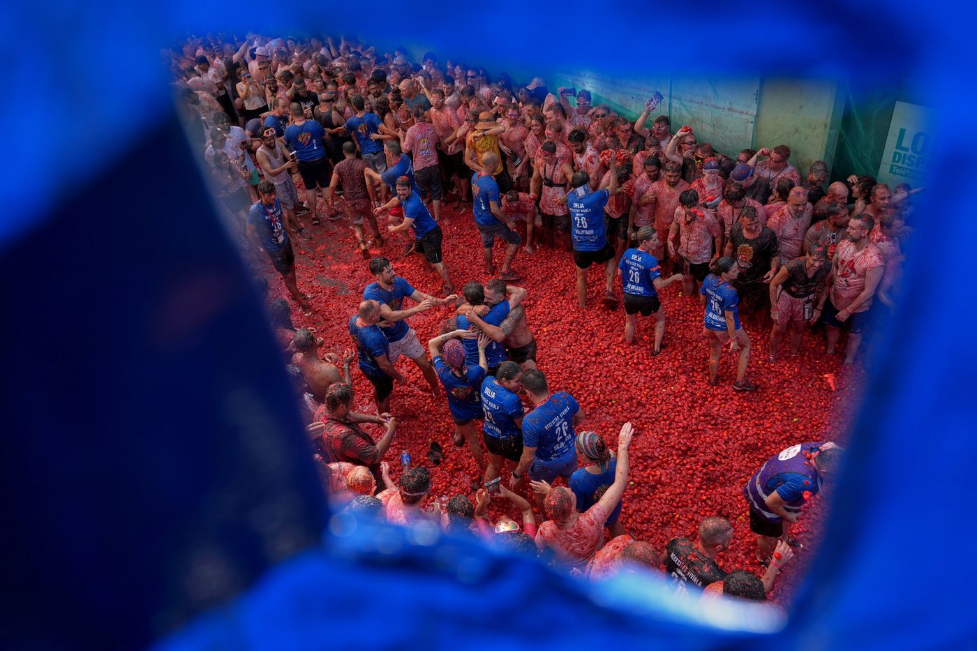 The epic La Tomatina food fight drew foreigners to paint a small Spanish town red | iNFOnews.ca