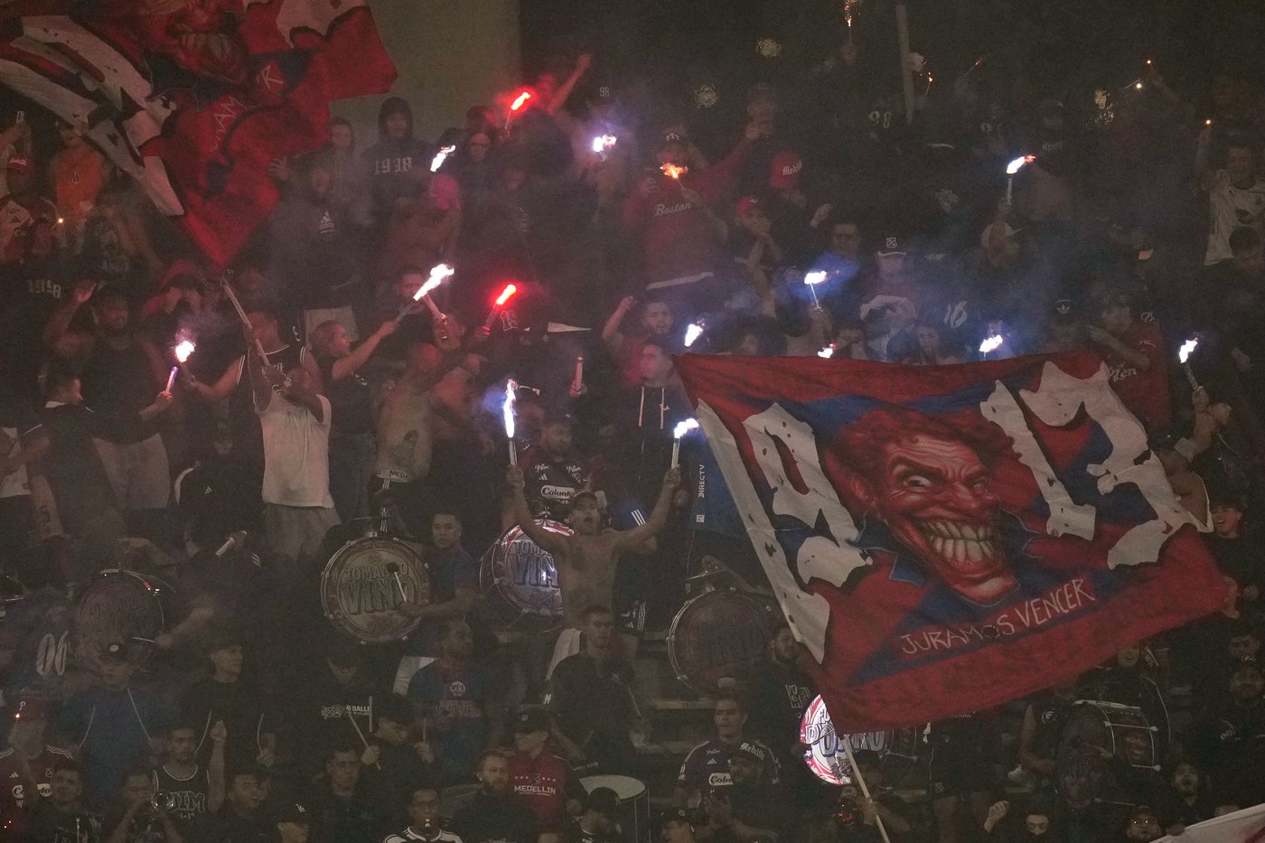 Copa Libertadores soccer match halted after just 3 minutes when fans protest with flares | iNFOnews.ca