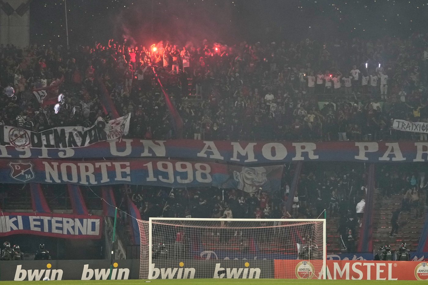Copa Libertadores soccer match halted after just 3 minutes when fans protest with flares | iNFOnews.ca