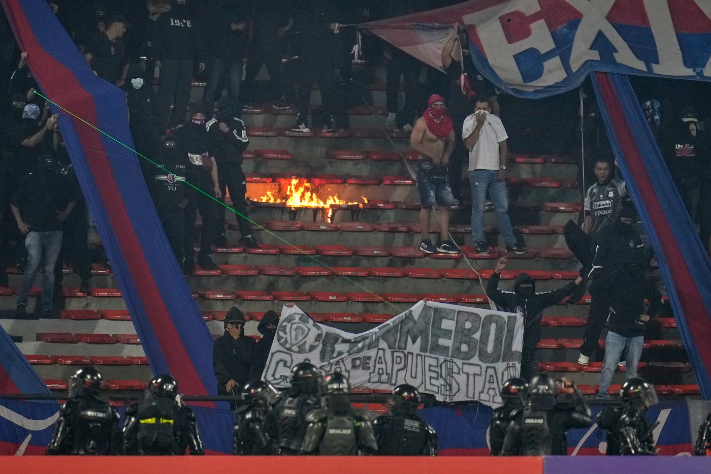 Copa Libertadores soccer match halted after just 3 minutes when fans protest with flares | iNFOnews.ca