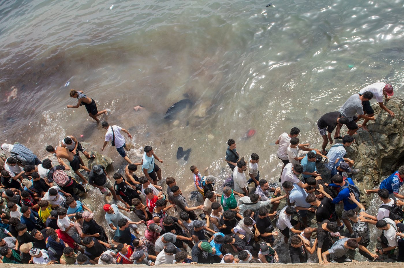 Moroccan families seek missing loved ones after the migrant surge to Spain's Ceuta | iNFOnews.ca Moroccan families seek missing loved ones after the migrant surge to Spain's Ceuta | iNFOnews.ca