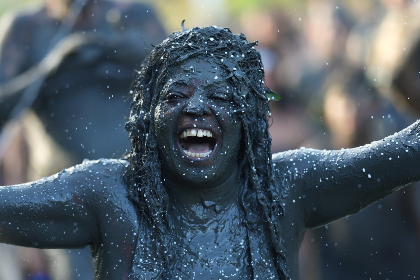 Forget glitter, this Carnival party in southern Brazil is all about mud | iNFOnews.ca