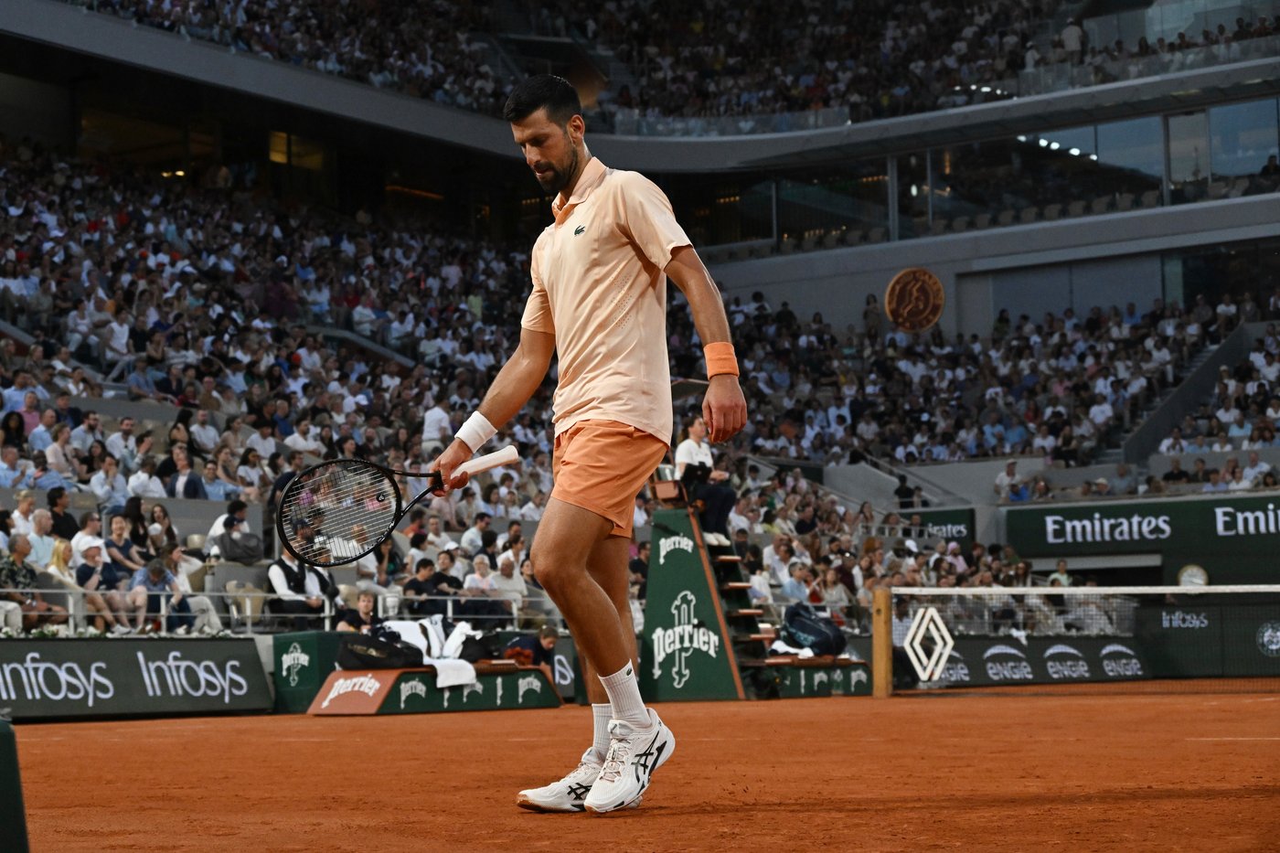 Novak Djokovic overcomes a slow start and hostile crowd in 1st-round win at French Open | iNFOnews.ca Novak Djokovic overcomes a slow start and hostile crowd in 1st-round win at French Open | iNFOnews.ca