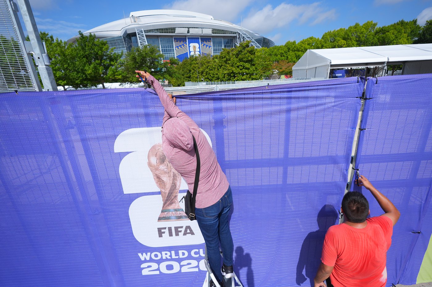 Sponsor-driven Cowboys waste little time pulling World Cup covers from stadium signage | iNFOnews.ca