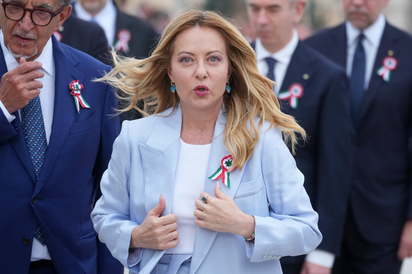 From black boots to pastel suits, Italian premier's wardrobe evolves with her politics | iNFOnews.ca