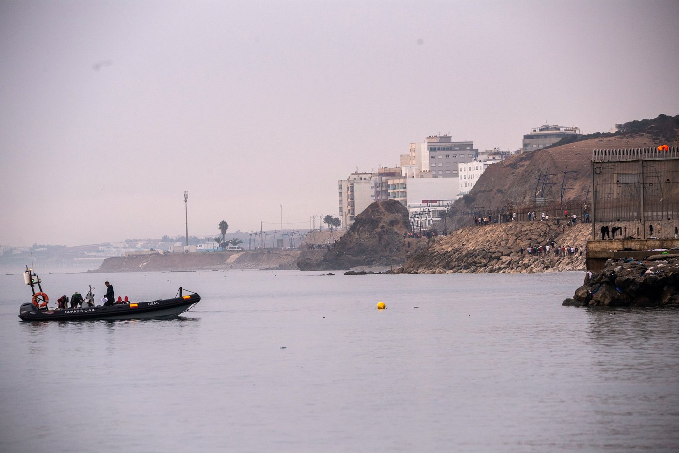 Spain installs sea barrier on Ceuta's border with Morocco after frontier rush that killed 67 | iNFOnews.ca Spain installs sea barrier on Ceuta's border with Morocco after frontier rush that killed 67 | iNFOnews.ca