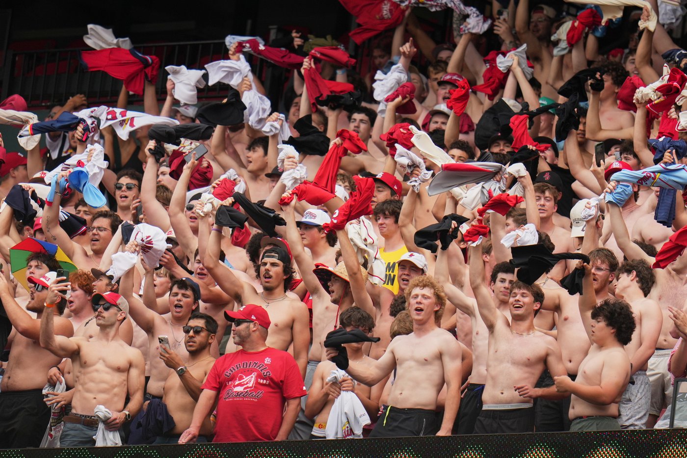 Shirtless fans the stars at MLB stadiums as 'Tarps Off' trend sweeps baseball world | iNFOnews.ca