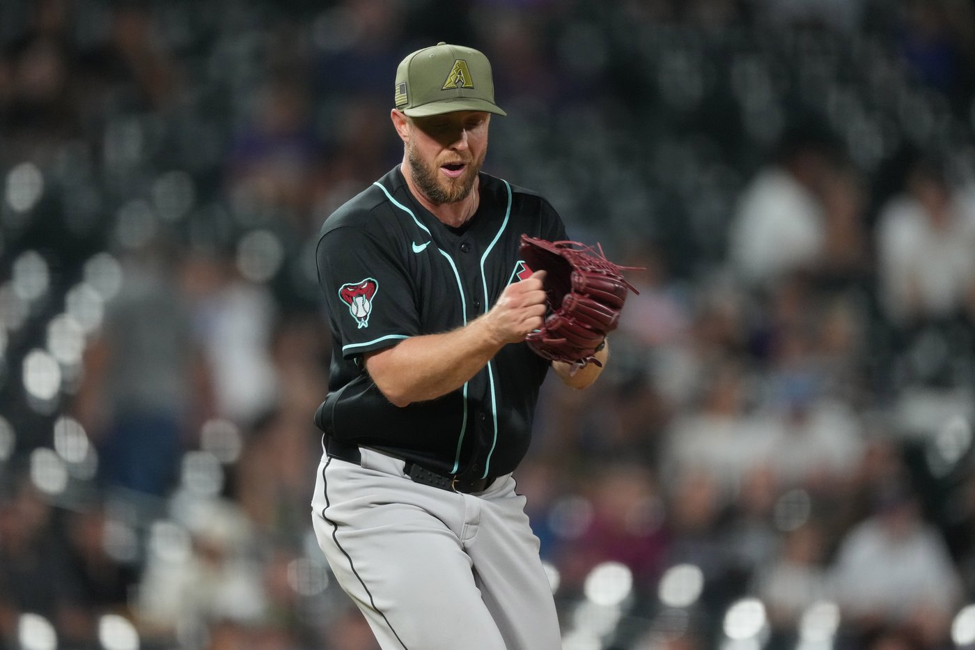 Merrill Kelly throws 1st career complete game, Diamondbacks beat Rockies 9-1 | iNFOnews.ca