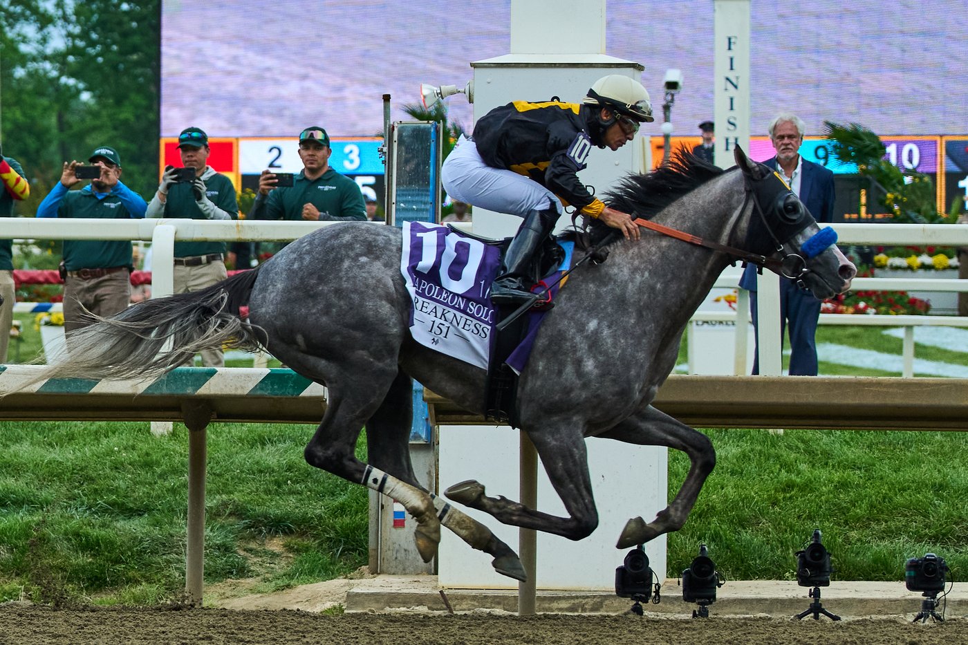 Napoleon Solo holds off Iron Honor by 1 1/4 lengths to win the Preakness at Laurel Park | iNFOnews.ca