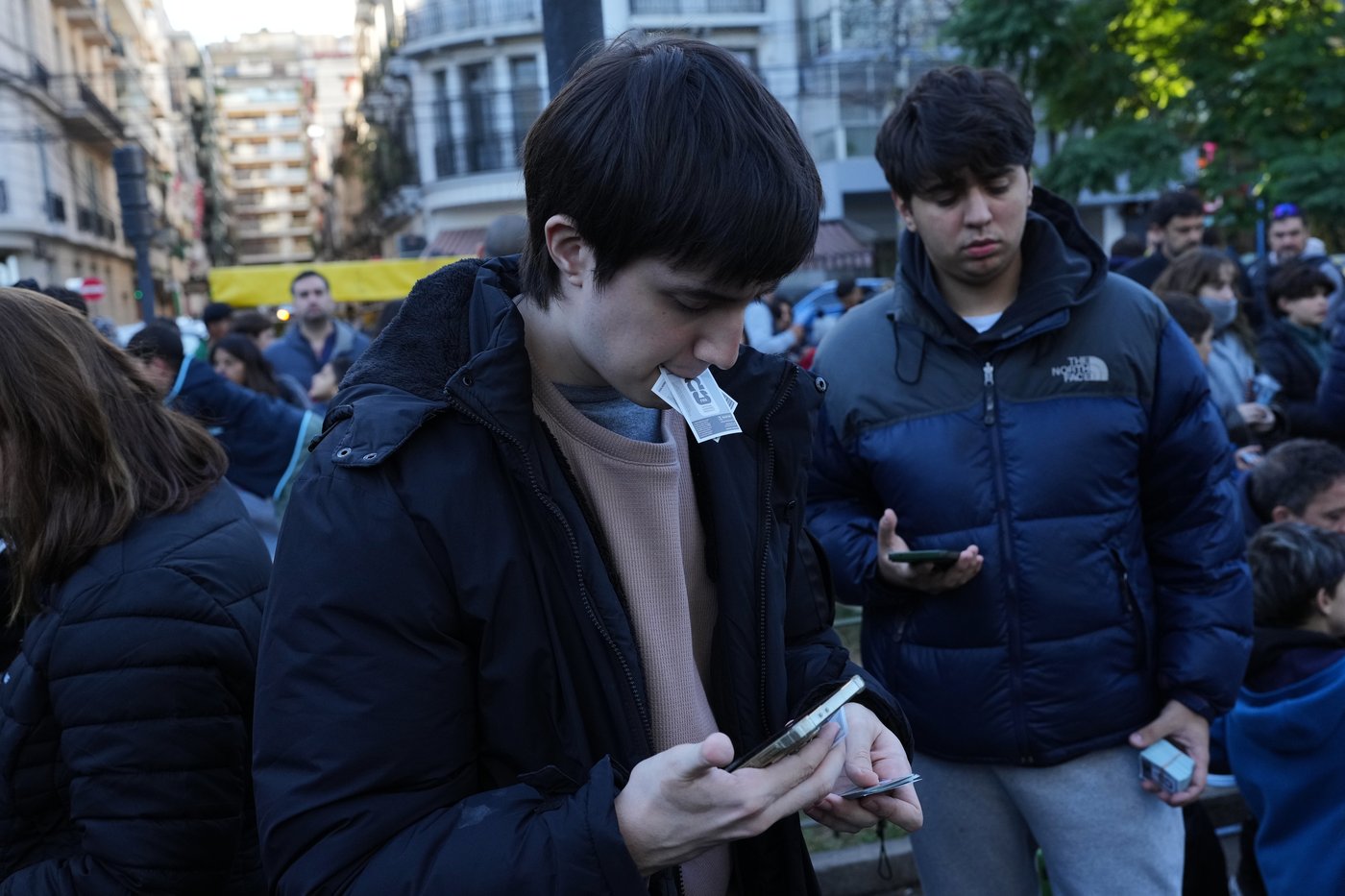 Argentine plazas buzz with World Cup sticker trading fever | iNFOnews.ca