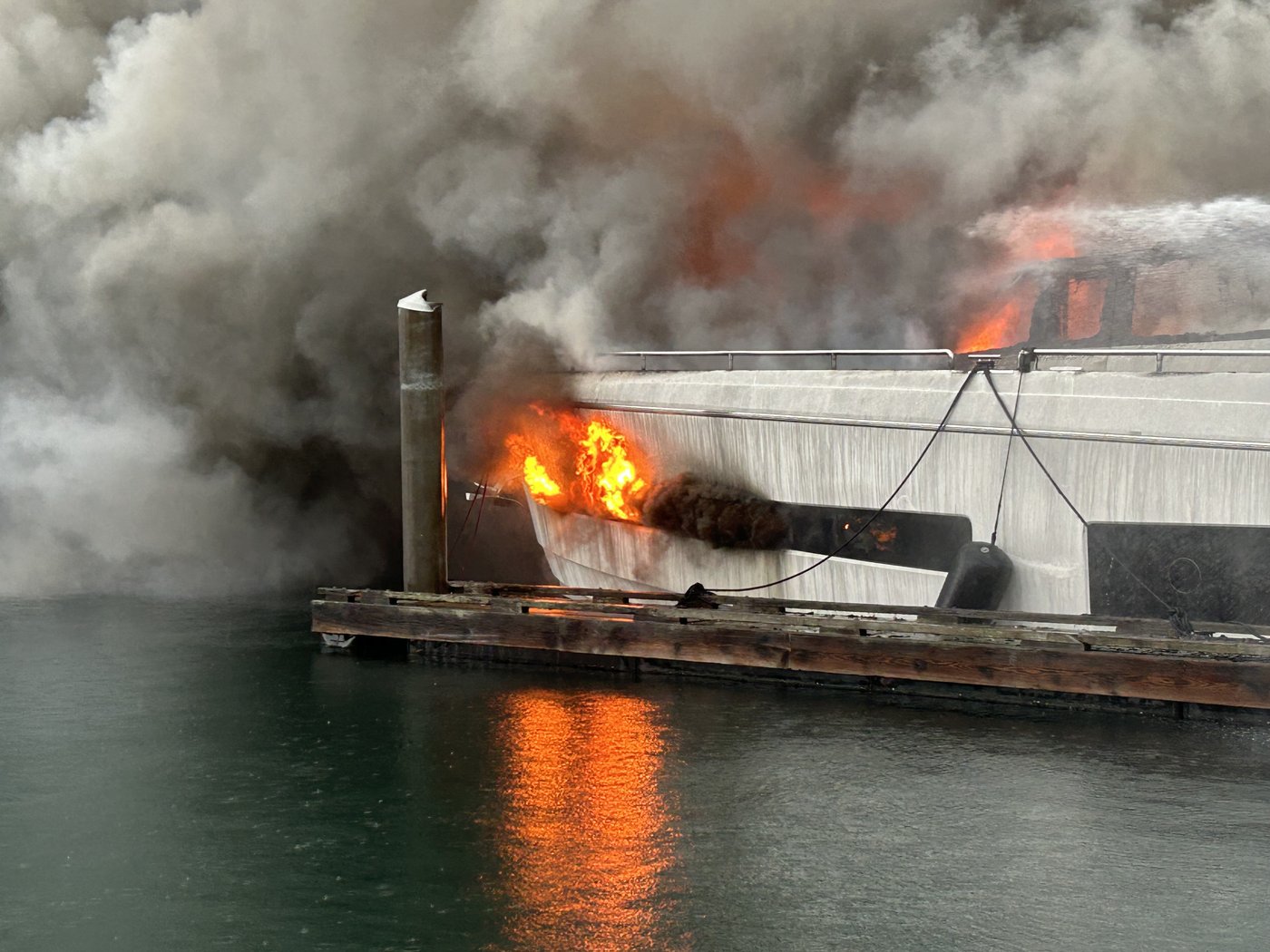 Fire chief says cause of fire that sank three yachts will likely never be found | iNFOnews.ca