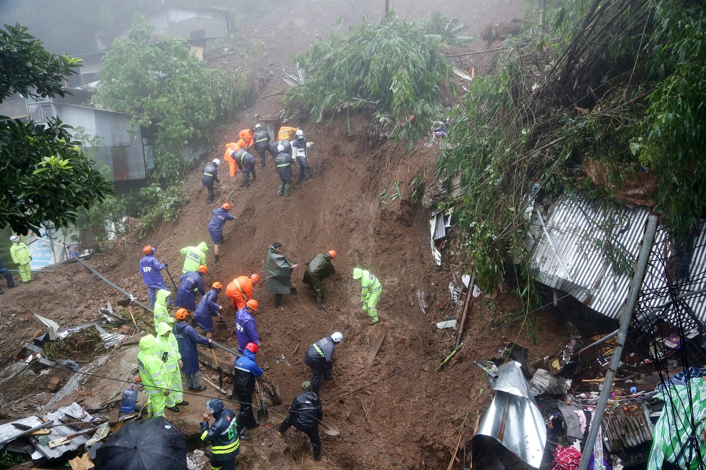 Photos show flooding and storm damage in the Philippines | iNFOnews.ca