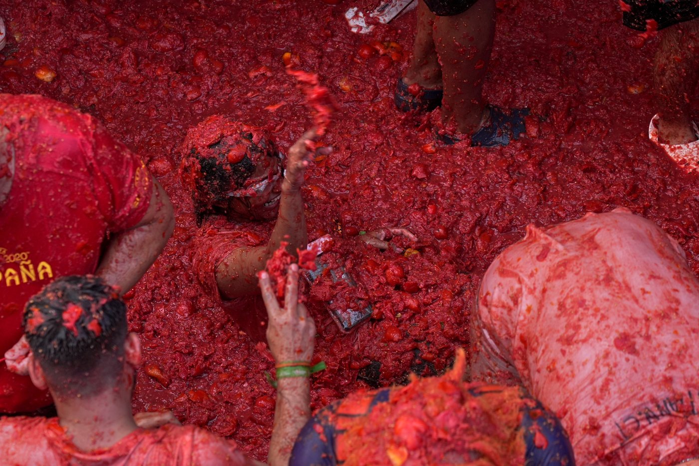 The epic La Tomatina food fight drew foreigners to paint a small Spanish town red | iNFOnews.ca