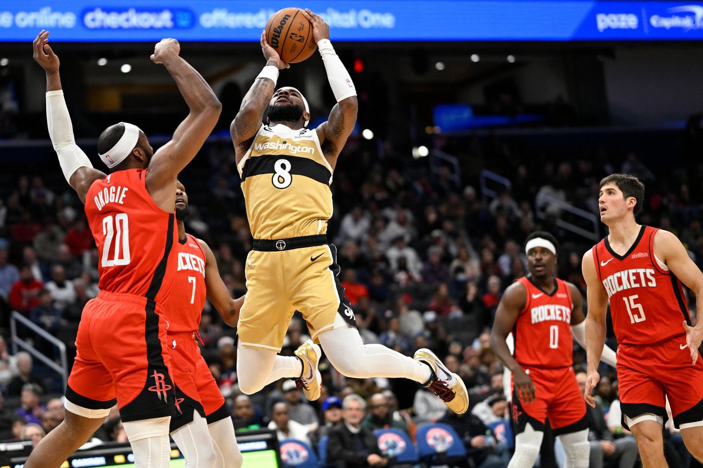 Rockets beat the Wizards 123-118 after Trae Young gets ejected for leaving the bench | iNFOnews.ca