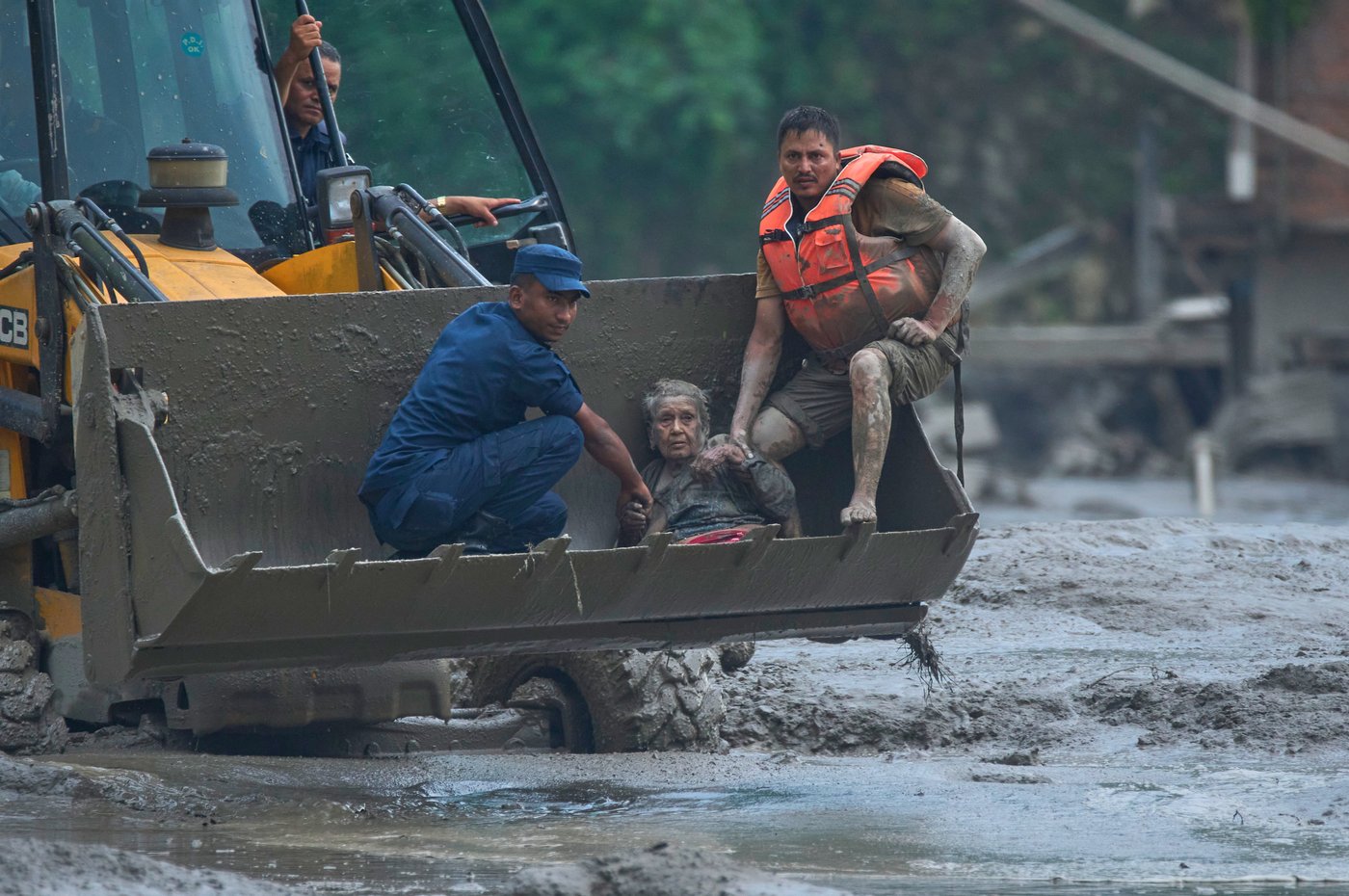 Photos show aftermath of flash floods in Nepal | iNFOnews.ca