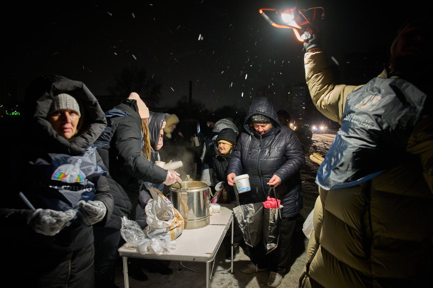 Photos show Ukrainians enduring a frigid winter after Russian strikes knocked out power | iNFOnews.ca