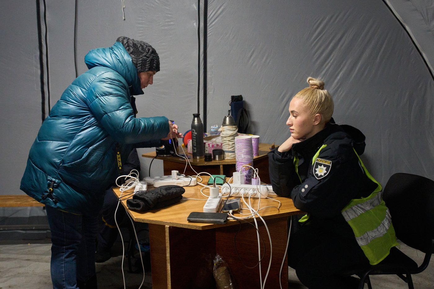 Photos show Ukrainians enduring a frigid winter after Russian strikes knocked out power | iNFOnews.ca