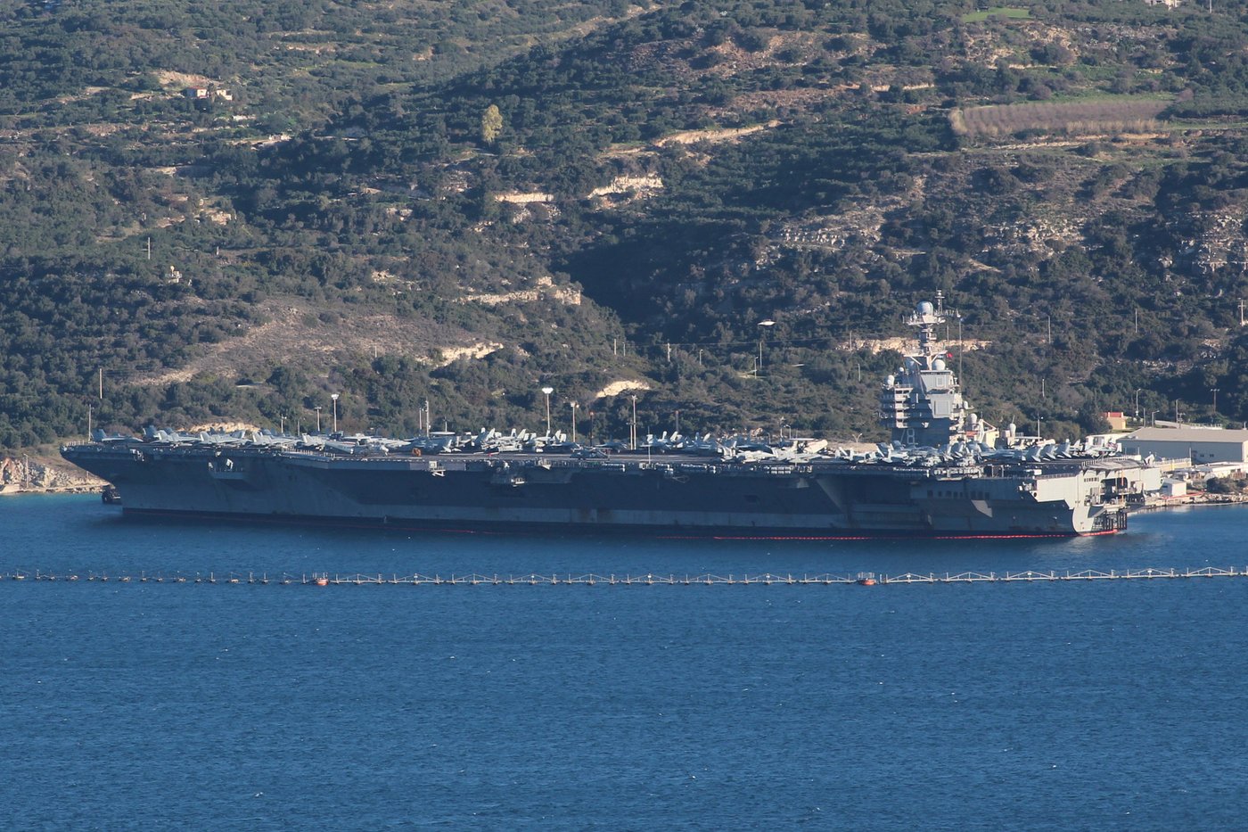 Protest held on Greek island against docked US aircraft carrier as Iran tension builds | iNFOnews.ca
