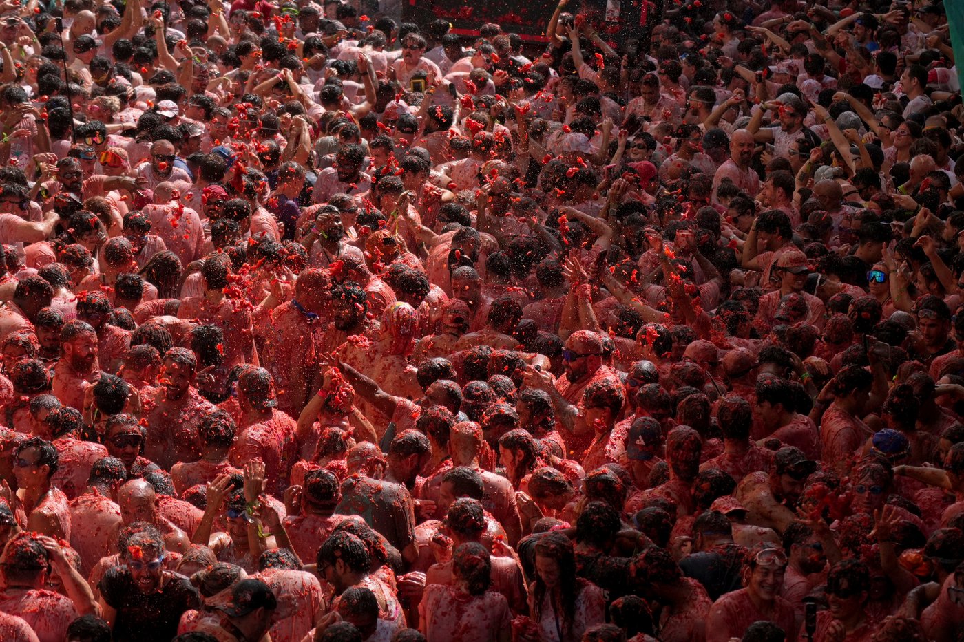 The epic La Tomatina food fight drew foreigners to paint a small Spanish town red | iNFOnews.ca