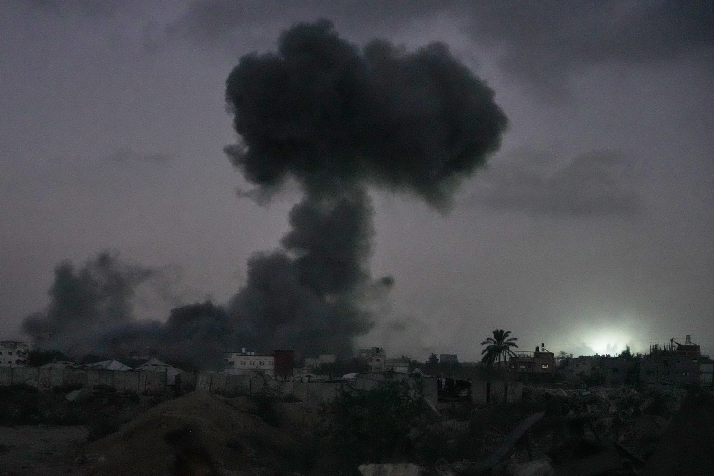 Israel's latest strikes kill a dozen people in Gaza, including police officers | iNFOnews.ca
