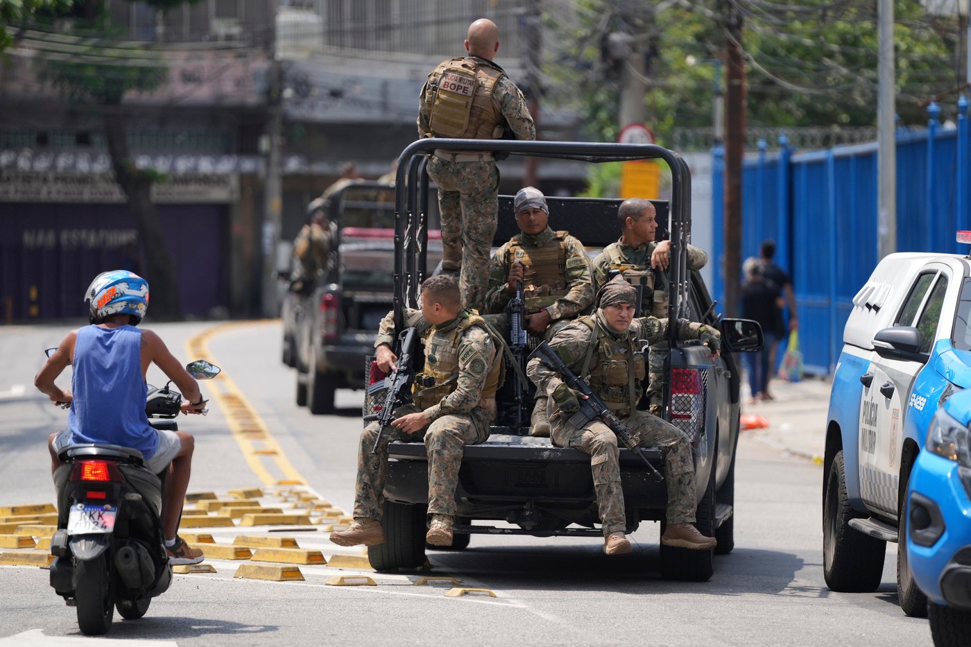 Rio police pull 4 officers from street duty in a probe into a deadly raid | iNFOnews.ca