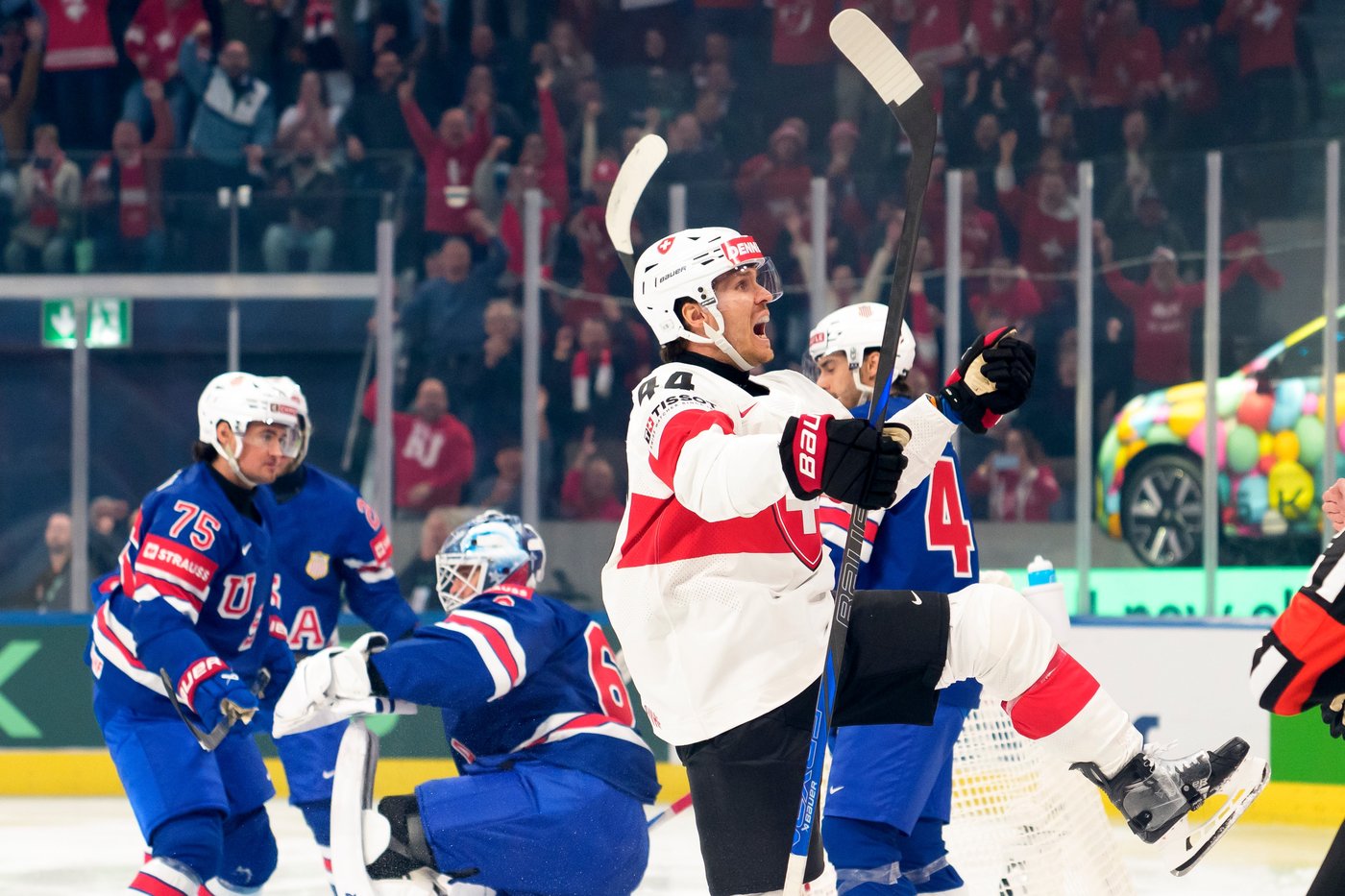 Switzerland beats defending champion the US in ice hockey worlds opener | iNFOnews.ca