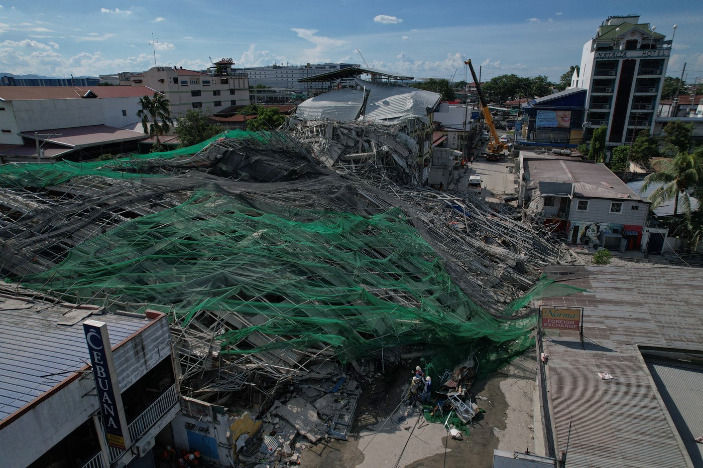 Building under construction in Philippines collapses, leaving 1 dead and 21 trapped | iNhome Building under construction in Philippines collapses, leaving 1 dead and 21 trapped | iNhome