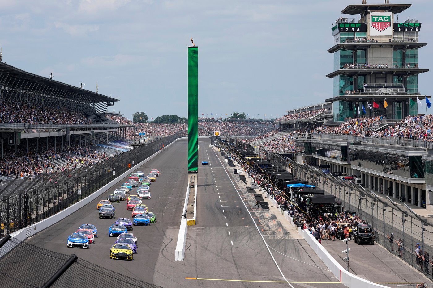 Corey Heim executes daring pass on final restart and holds on for historic Brickyard 400 victory | iNFOnews.ca