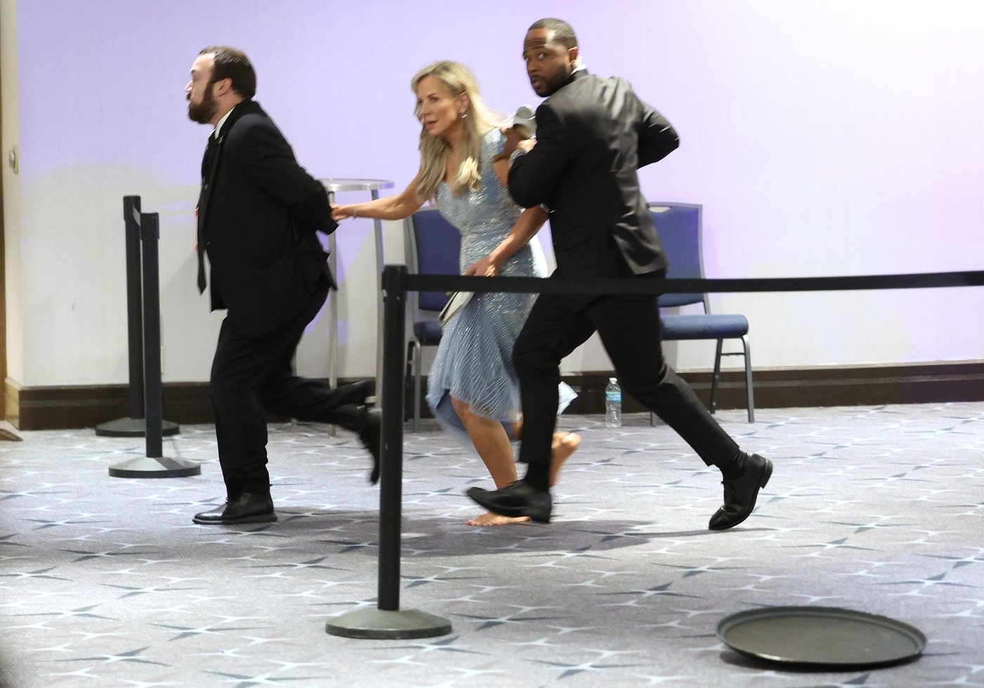 Trump safe after he is evacuated following shooting at Washington journalists' dinner, in photos | iNFOnews.ca