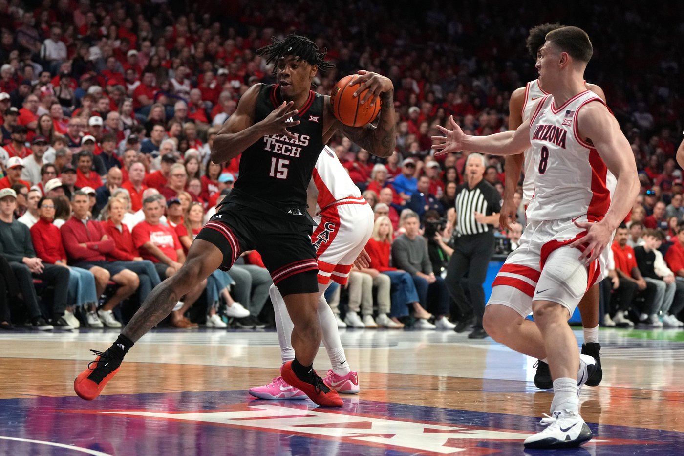 JT Toppin puts on low-post masterclass in No. 16 Texas Tech's OT win over No. 1 Arizona | iNFOnews.ca