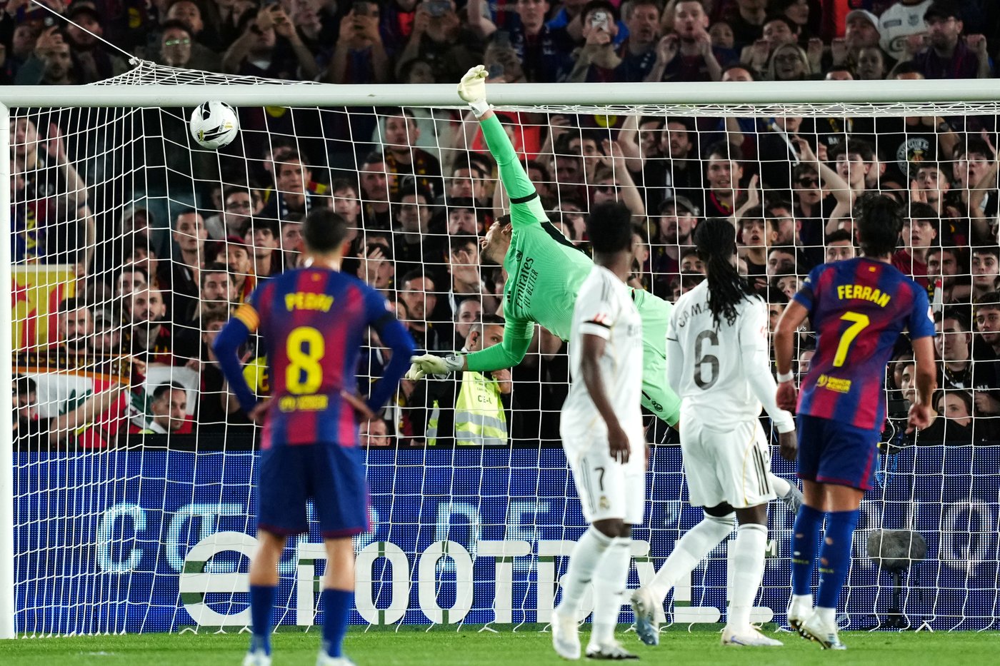 Watched by its grieving coach, Barcelona retains Spanish league title by beating rival Real Madrid | iNFOnews.ca