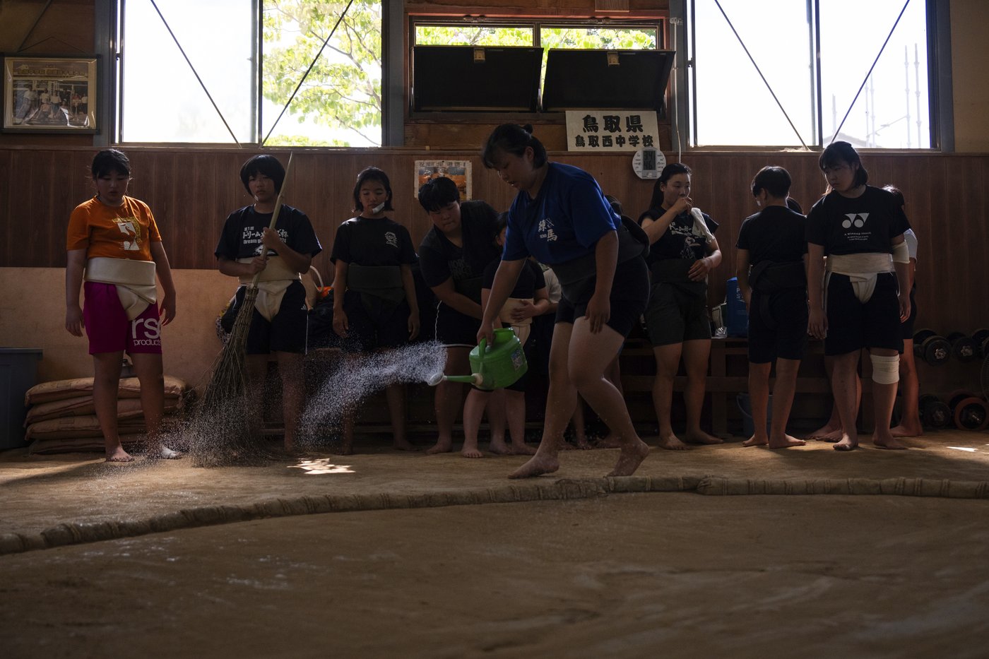 Photos show women in Japan working to break down barriers in ancient, tradition-bound sumo | iNFOnews.ca
