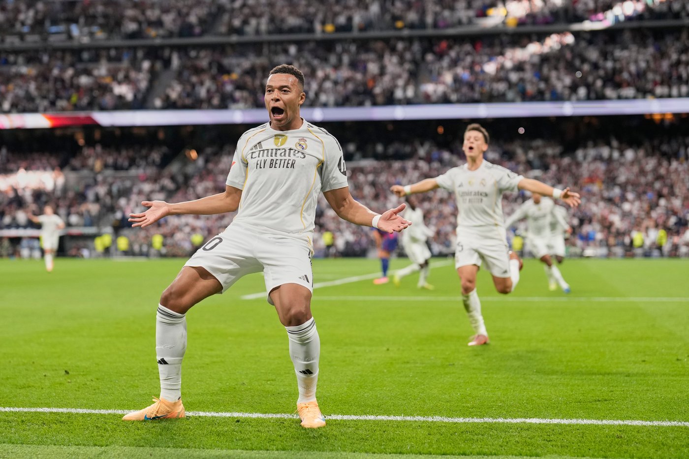 Mbappé and Bellingham score in tense clasico as Madrid wins 2-1 to end losing run against Barcelona | iNFOnews.ca Mbappé and Bellingham score in tense clasico as Madrid wins 2-1 to end losing run against Barcelona | iNFOnews.ca