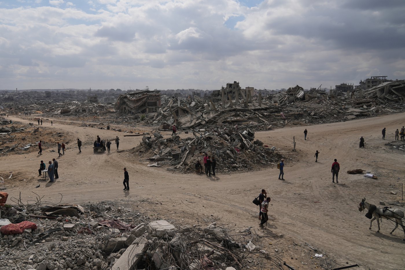 The Latest: Palestinians journey back home as aid convoys start to enter Gaza | iNFOnews.ca