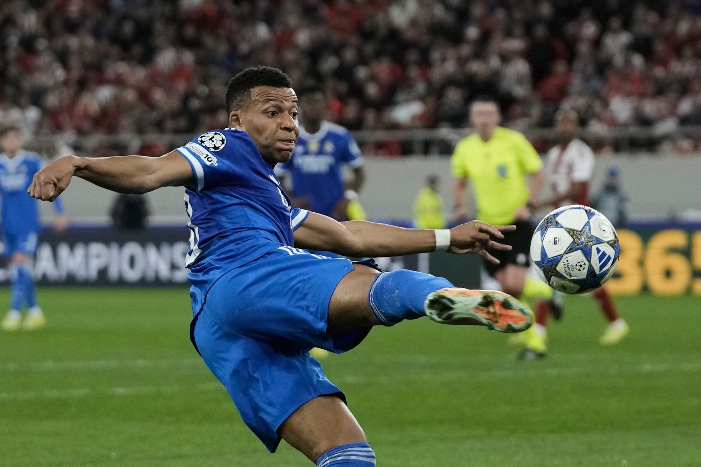 Mbappé nets quick hat trick in his 4-goal game as Real Madrid beats Olympiakos in Champions League | iNFOnews.ca