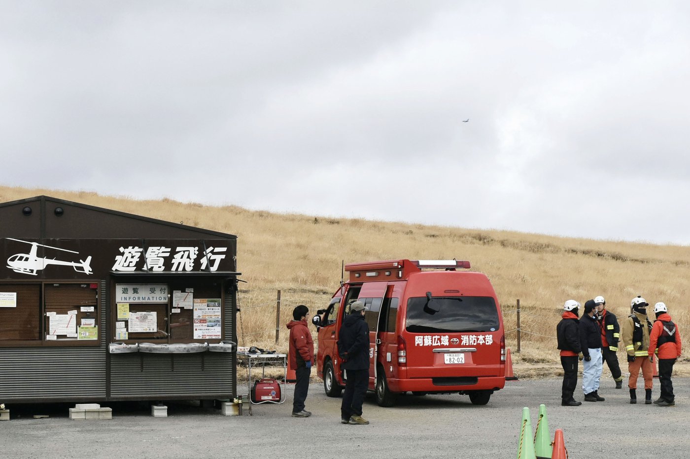 Rescuers spot wreckage possibly from a helicopter that went missing near a volcano in Japan | iNFOnews.ca