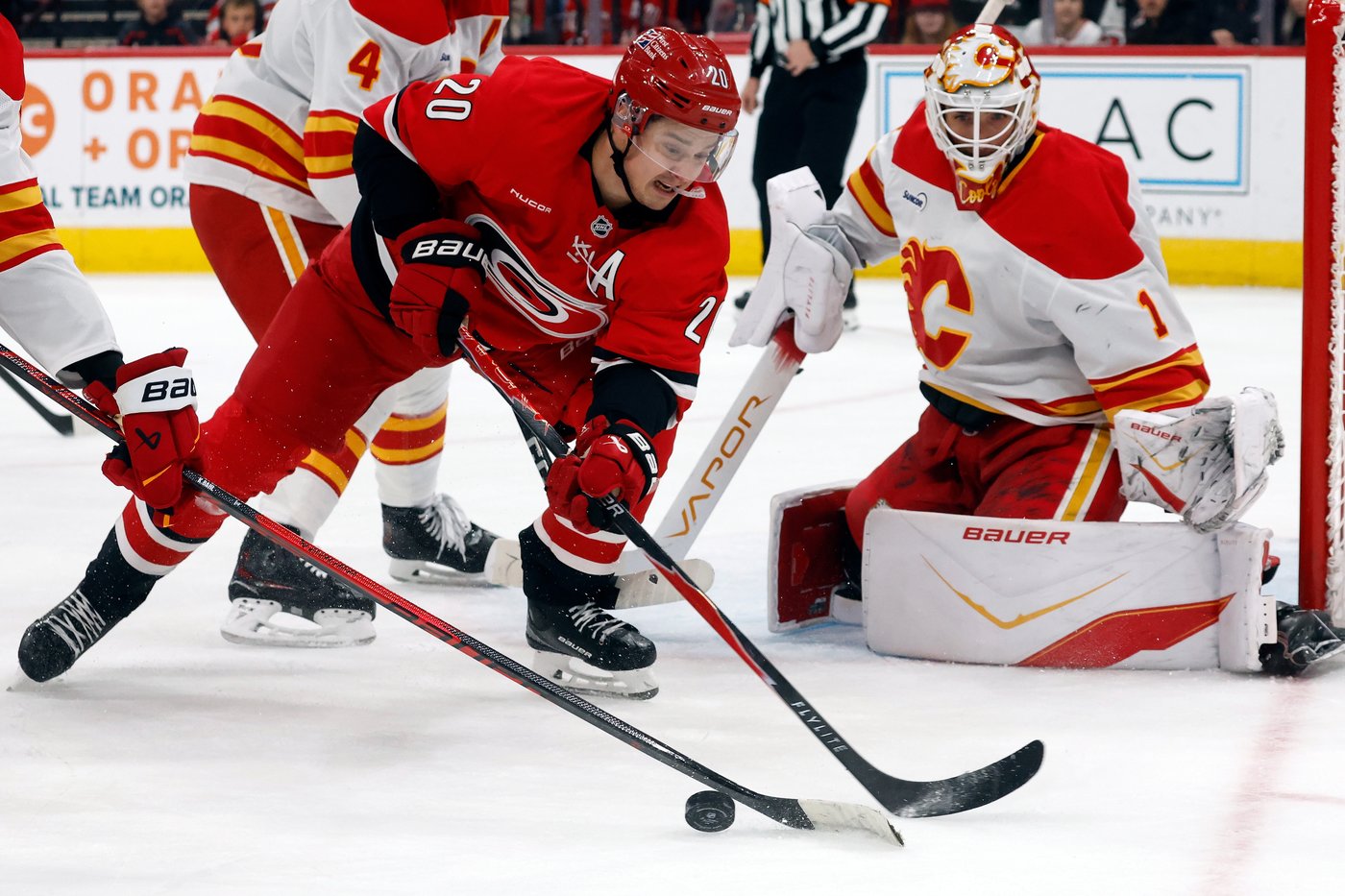 Bussi makes 15 saves for 1st NHL shutout, Ehlers scores in OT in Hurricanes' 1-0 win over Flames | iNFOnews.ca