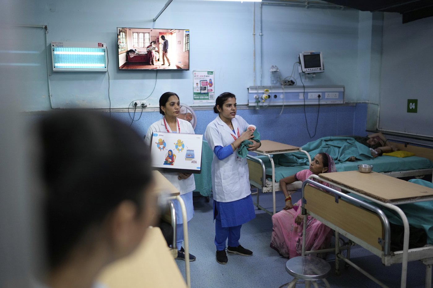 PHOTO ESSAY: Newborn caregiving programs help ease parenting in India | iNFOnews.ca