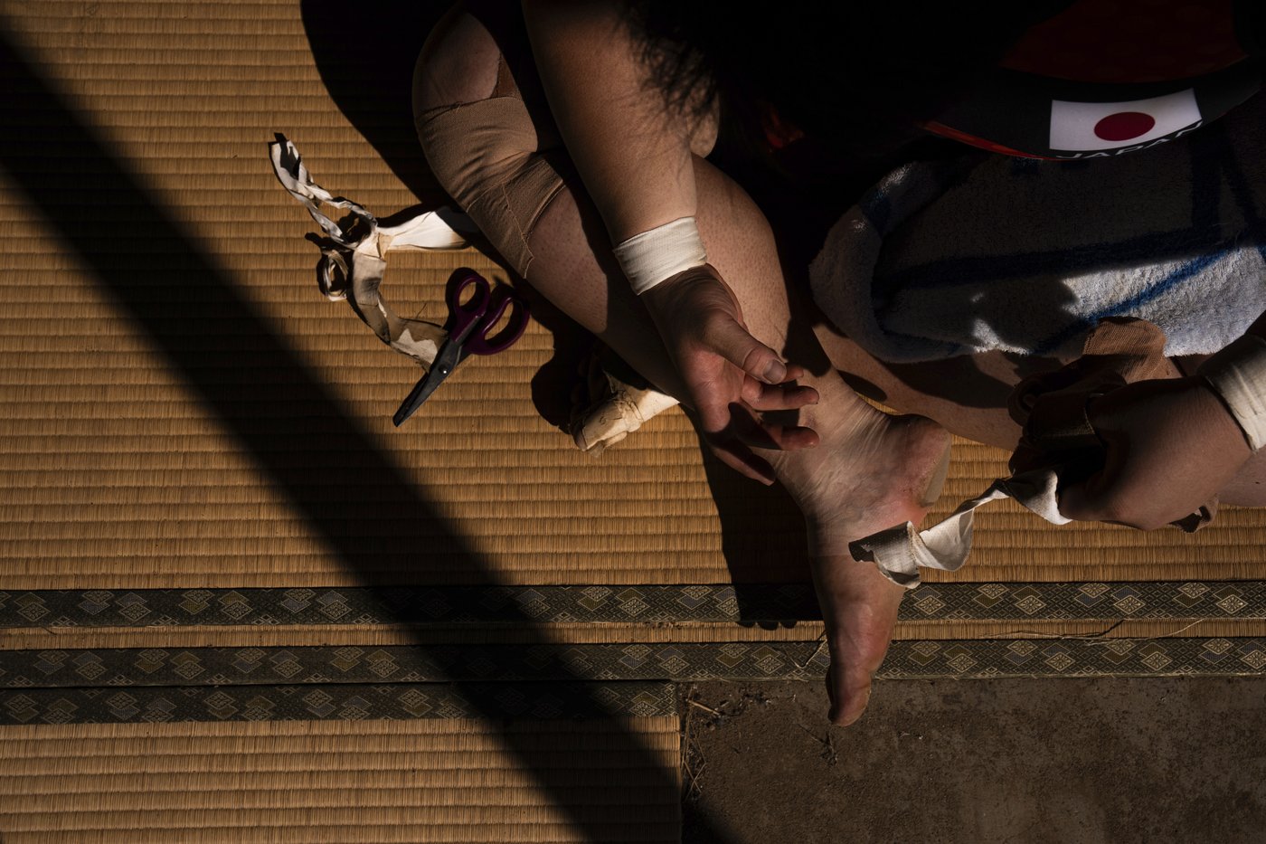 Photos show women in Japan working to break down barriers in ancient, tradition-bound sumo | iNFOnews.ca