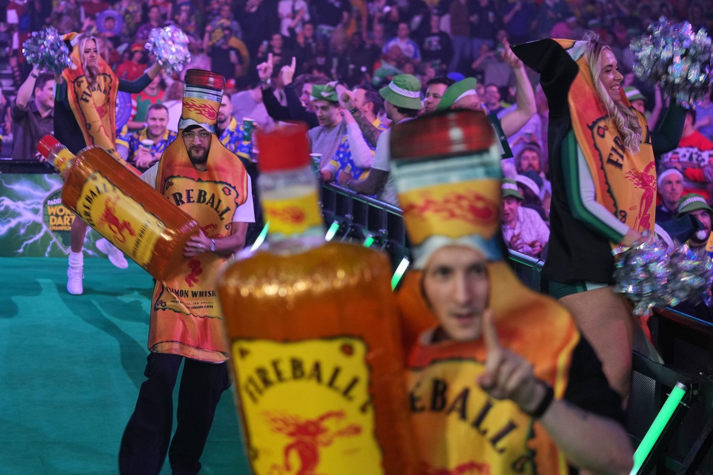 Costumes and competitors light up the World Darts Championships in London, in photos | iNFOnews.ca