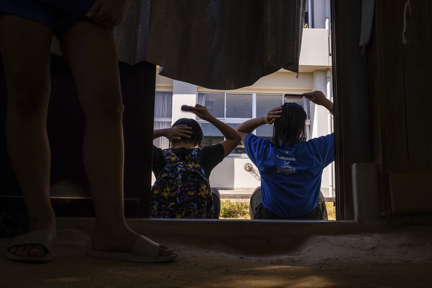 Photos show women in Japan working to break down barriers in ancient, tradition-bound sumo | iNFOnews.ca