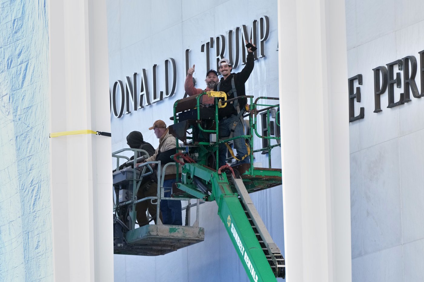 Photos of Trump's name being added to the Kennedy Center | iNFOnews.ca