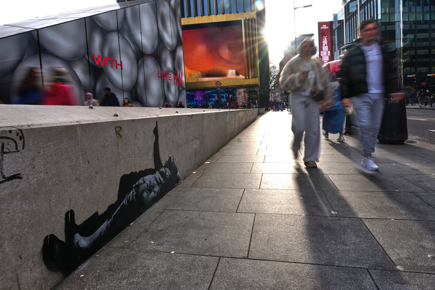 Banksy unveils new art in London following speculation over murals depicting stargazing figures | iNFOnews.ca