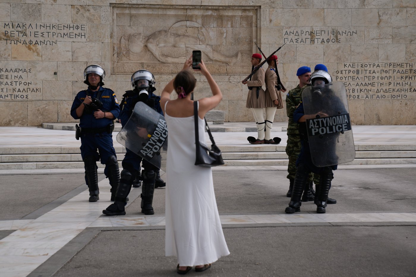 Thousands march in Athens against labor law changes, disrupt services nationwide | iNFOnews.ca