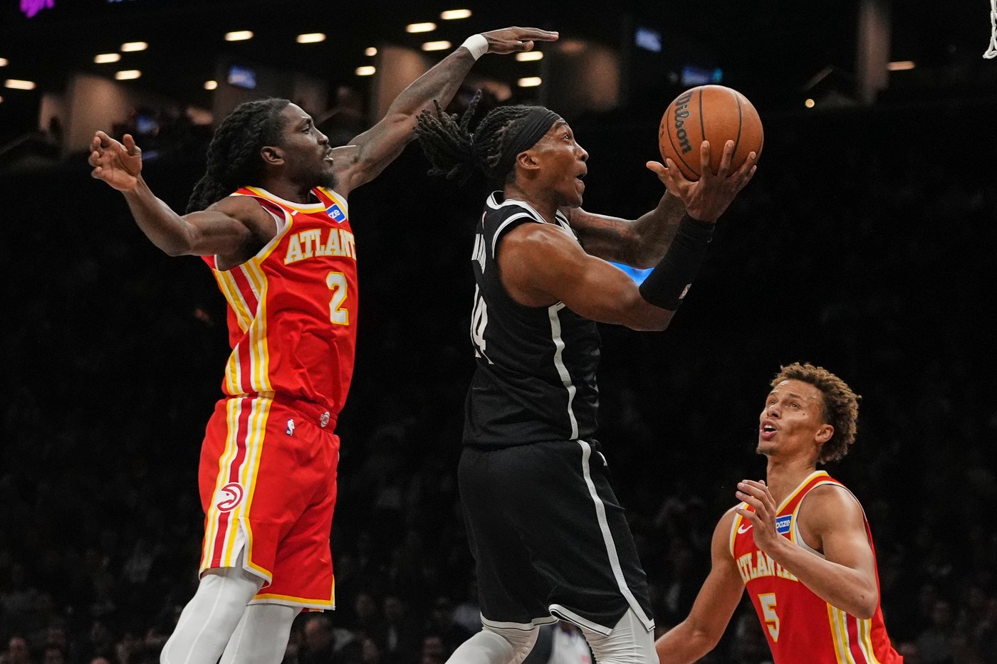 Jalen Johnson and Hawks hold off winless Nets 117-112 after Trae Young exits with knee injury | iNFOnews.ca