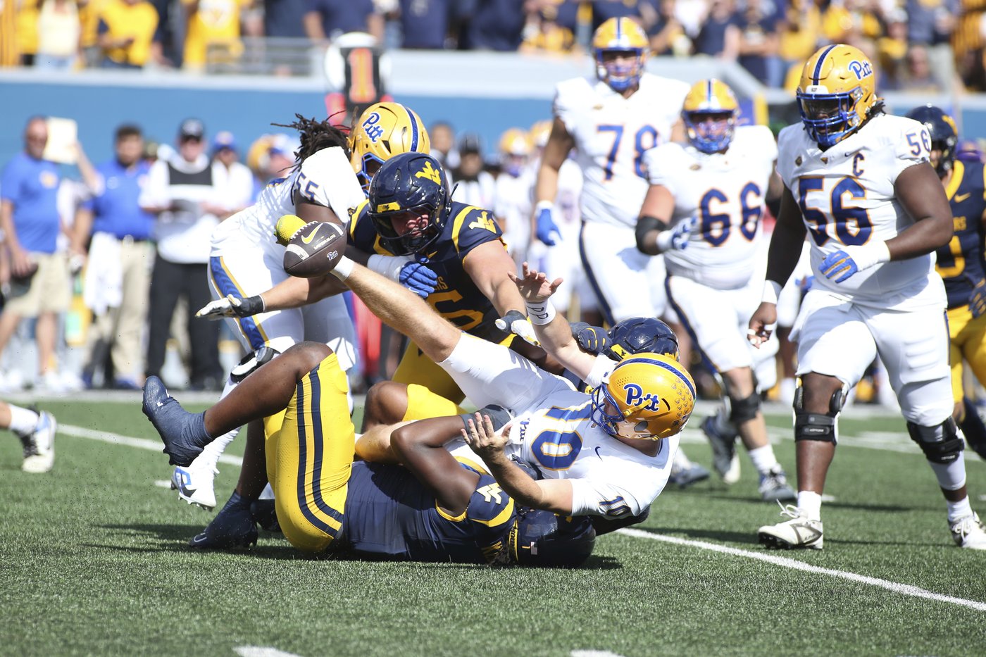 Edwards' short TD run in overtime leads West Virginia over Pittsburgh 31-24 in the Backyard Brawl | iNFOnews.ca