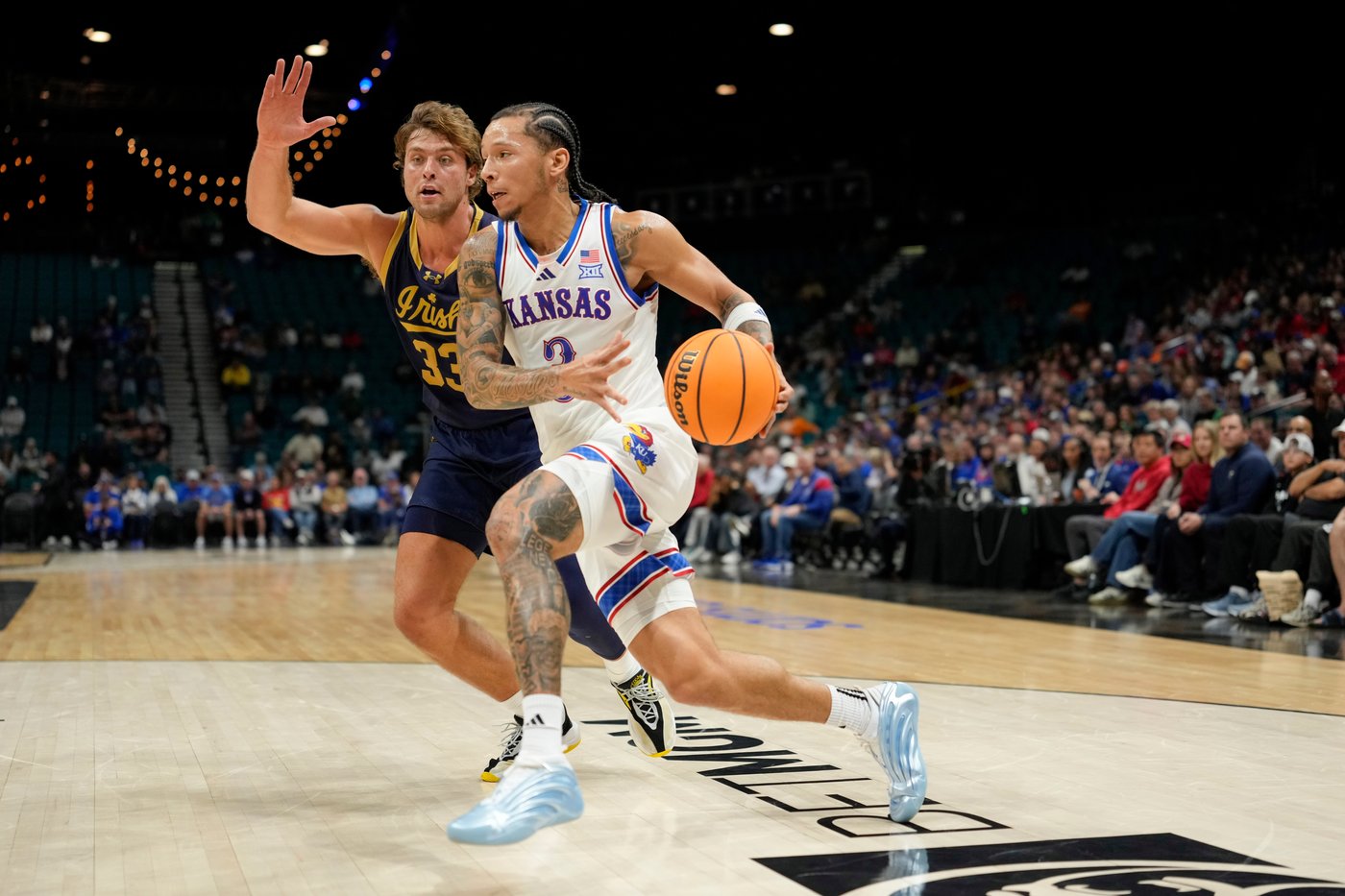 Flory Bidunga's 18 points, 9 rebounds, 5 assists and 5 blocks lead Kansas past Notre Dame 71-61 | iNFOnews.ca