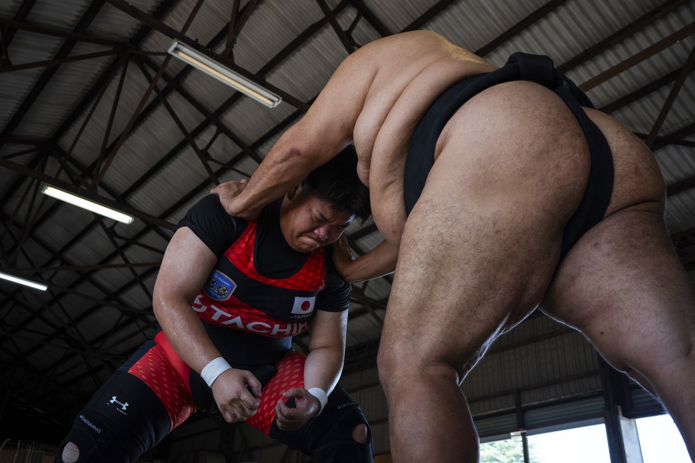 Photos show women in Japan working to break down barriers in ancient, tradition-bound sumo | iNFOnews.ca