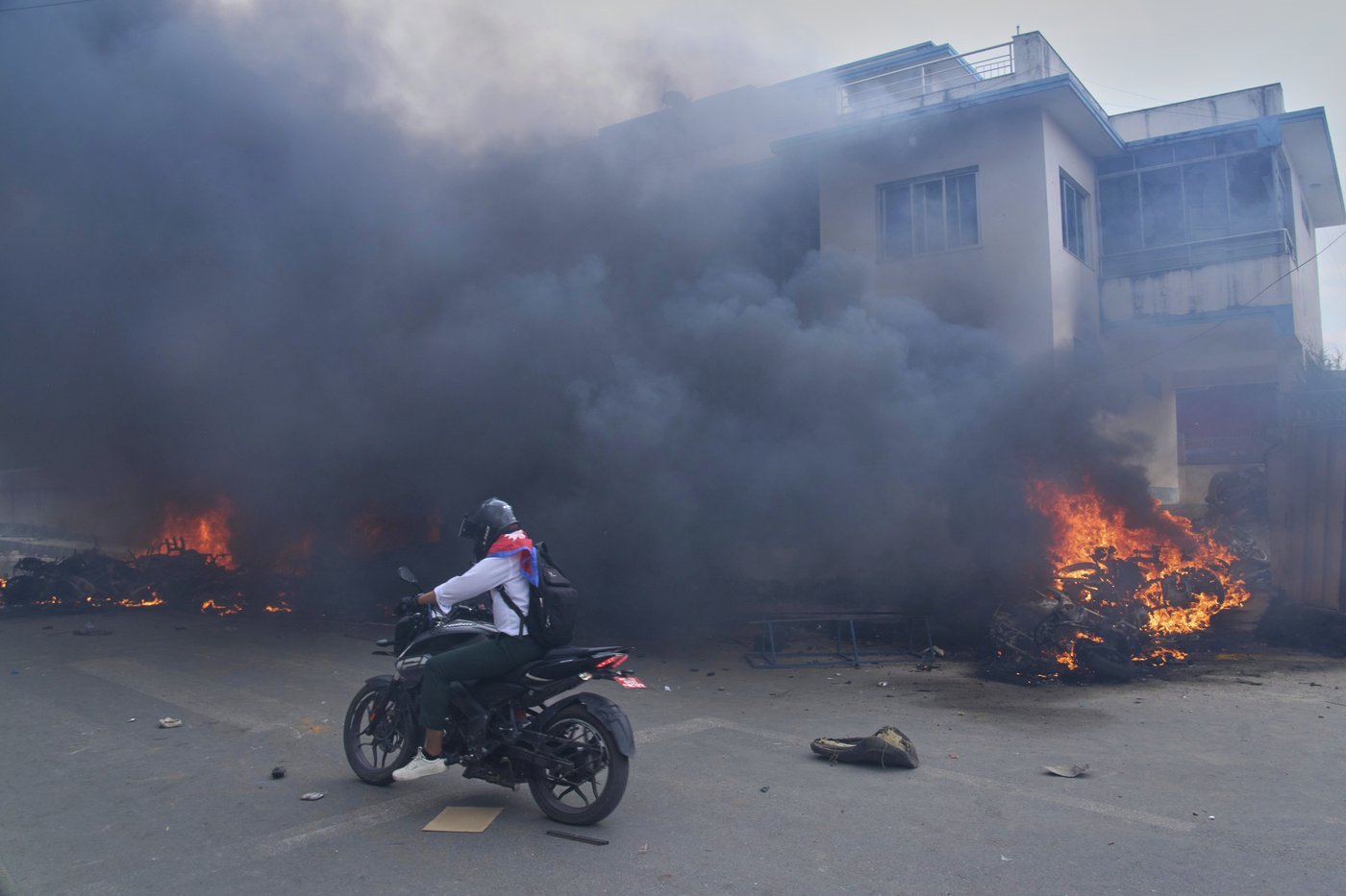 Photos show violent protests in Nepal, with government buildings set on fire | iNFOnews.ca