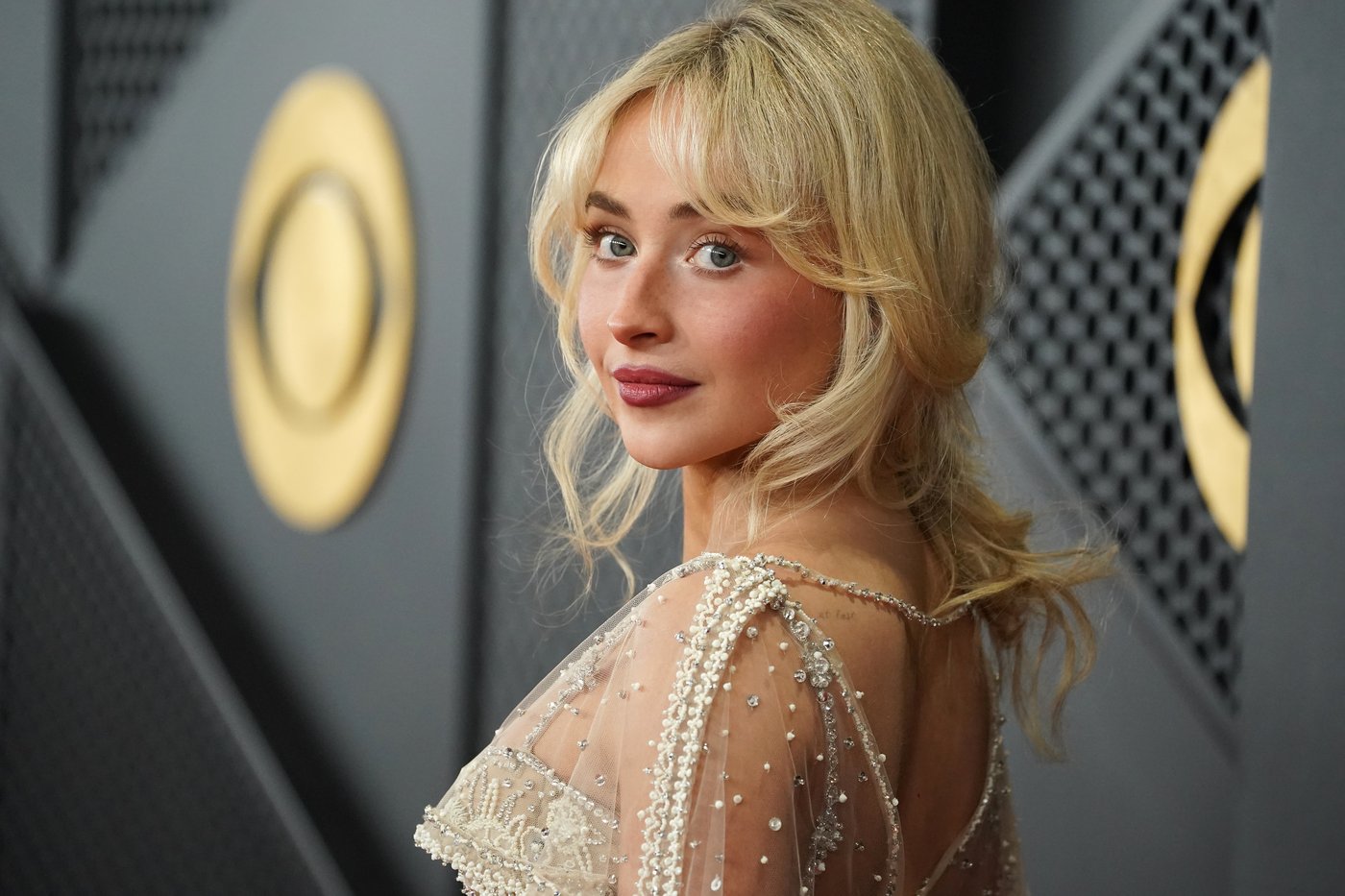 Addison Rae, Olivia Dean and other rising stars take up space on Grammys red carpet | iNFOnews.ca